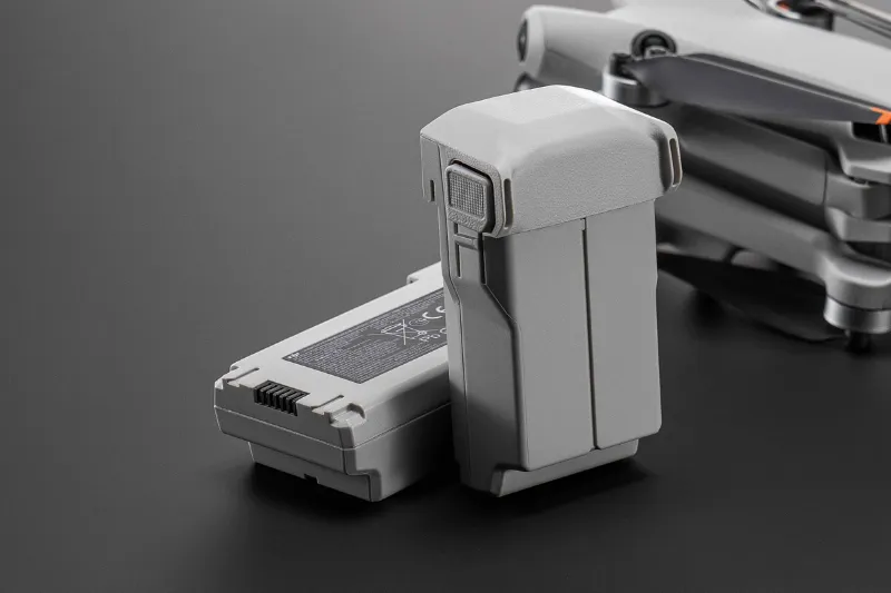DJI drones Mini 4 Pro Intelligent Flight Battery Plus, gray rectangular battery with LED indicators