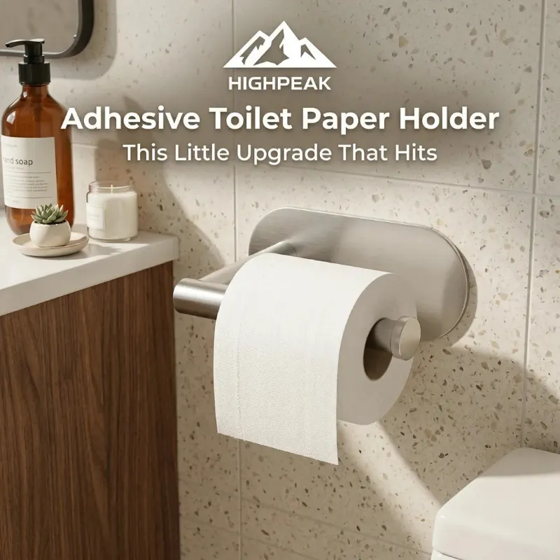 HighPeak Adhesive Toilet Paper Holder, a stainless steel wall-mounted holder in a modern bathroom