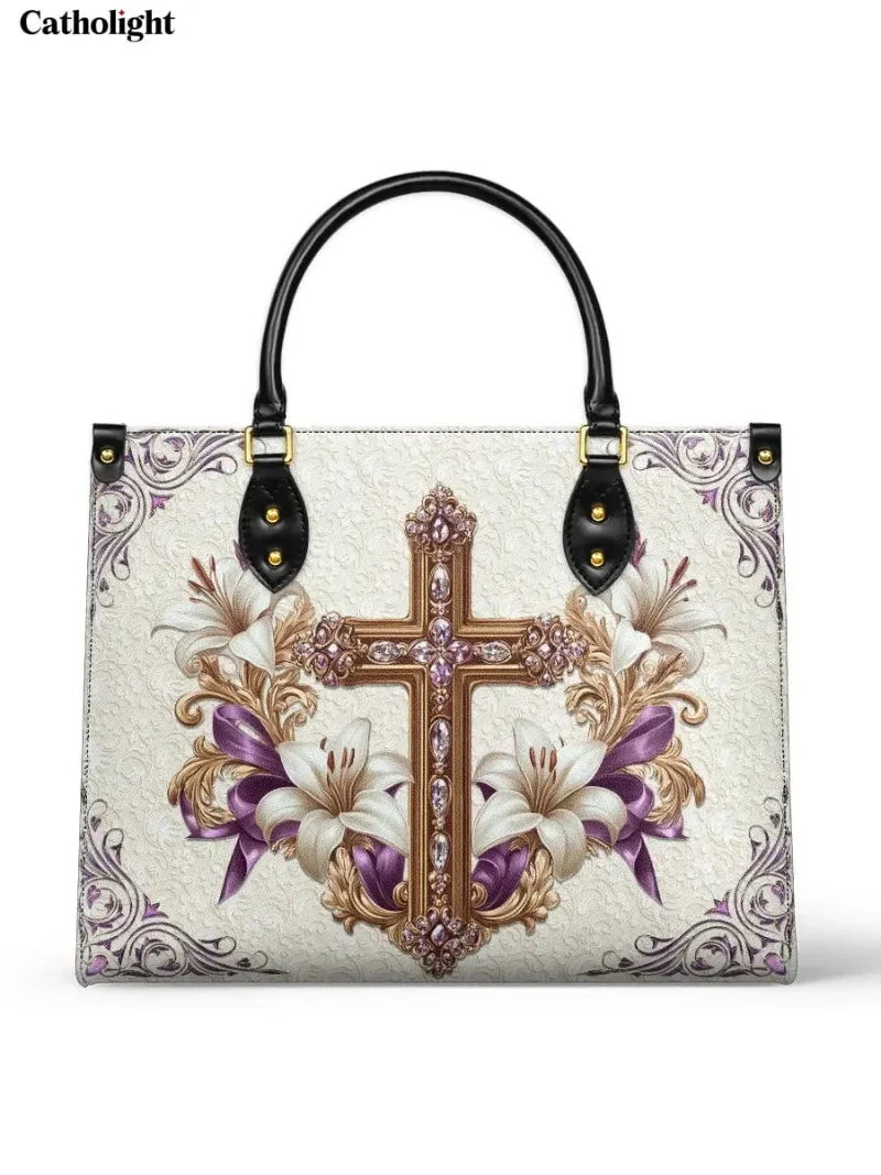 Catholight Faith & Florals Leather Bag showing a jeweled cross design with white lilies on ivory background