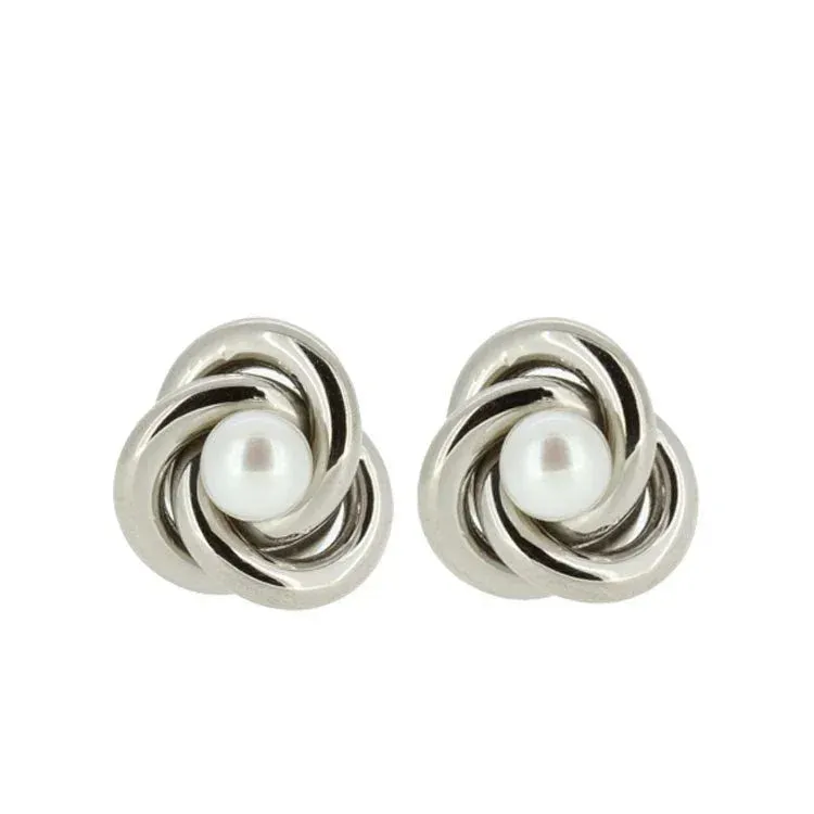Nammi Celtic Knot Titanium Earrings with Freshwater Pearl showing white pearl nestled in Celtic knot design