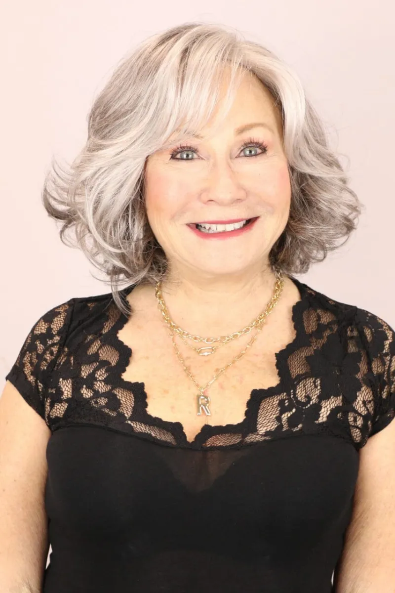 Godiva's Secret Wigs Monroe medium wig, wavy layered style in Silver Stone shown on head