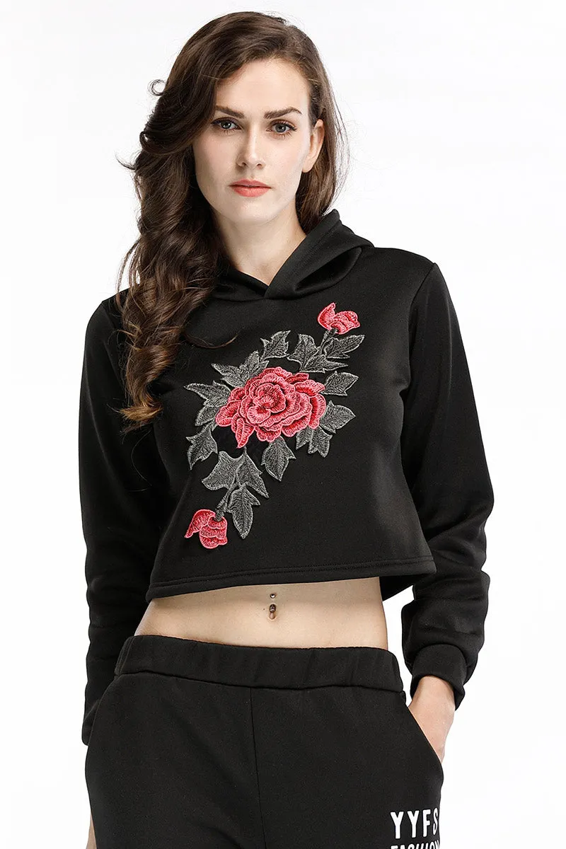 Mislish Black Flower Embroidered Crop Sweatshirt, front view showing black fabric with floral embroidery
