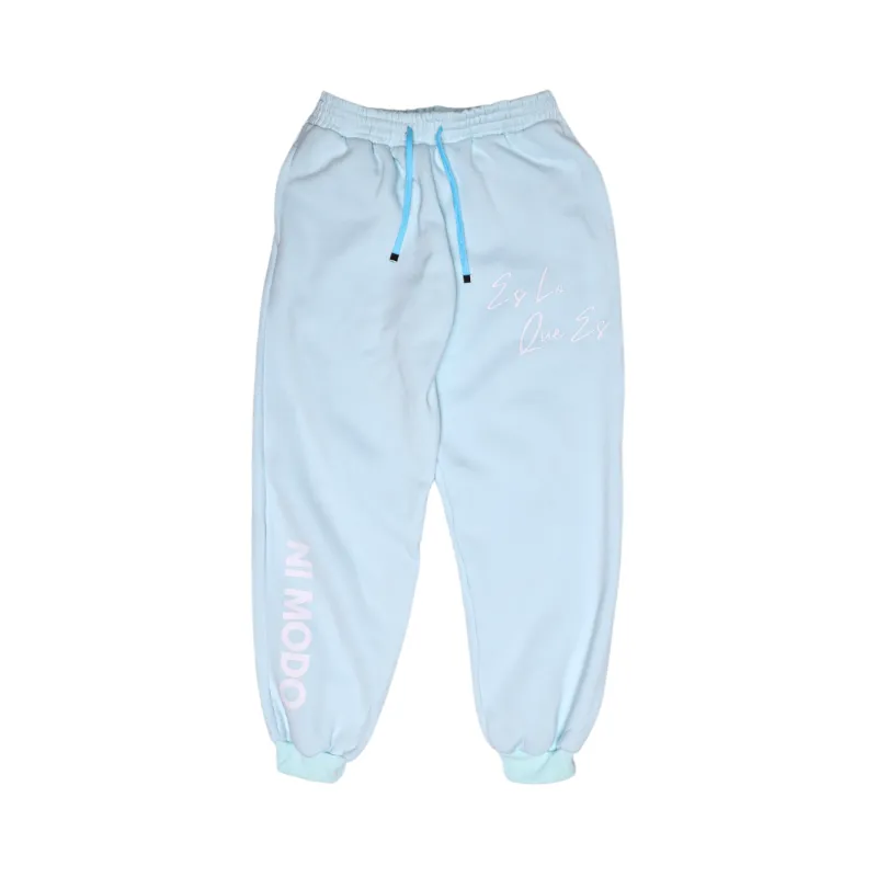 Nimodo Es Lo Que Es sweatpants in frosted blue with Ni Modo and Es Lo Que Es leg graphics
