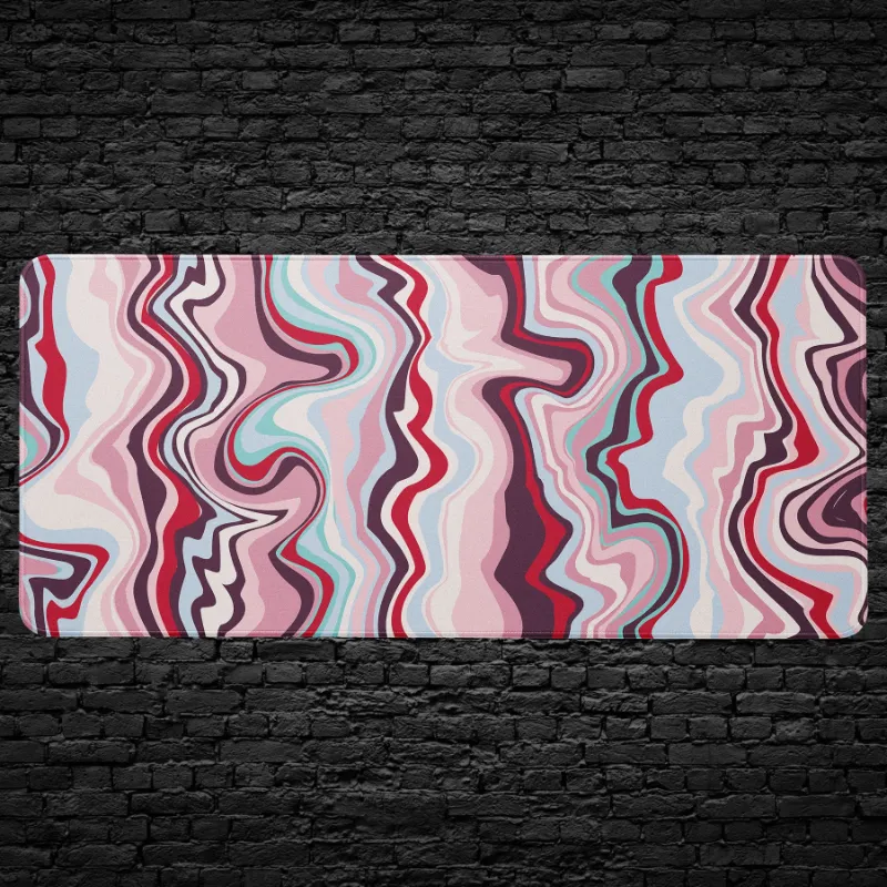 CruArt Abstract Wavy Pattern Desk Mat with flowing red, pink, and teal waves