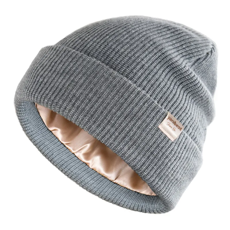 Yanibest Butter Satin Lined Knit Skull Beanie in Medium Grey shown on model