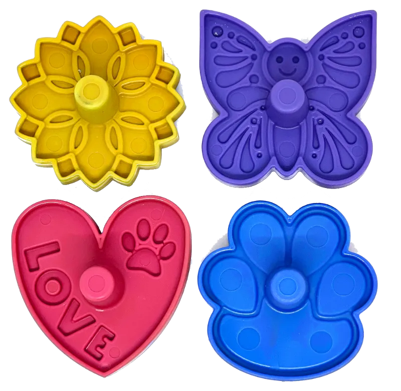 Soda Pup Unstoppables Stopper & Stand for SodaPup Rubber Treat Dispensers - 4 Pack nylon stoppers on a table