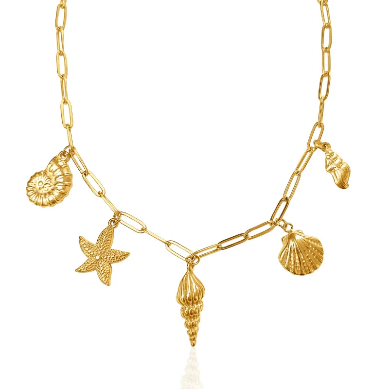 DORSYA Treasures of the Sea Gold Charm Necklace with shell and starfish charms hanging from gold chain