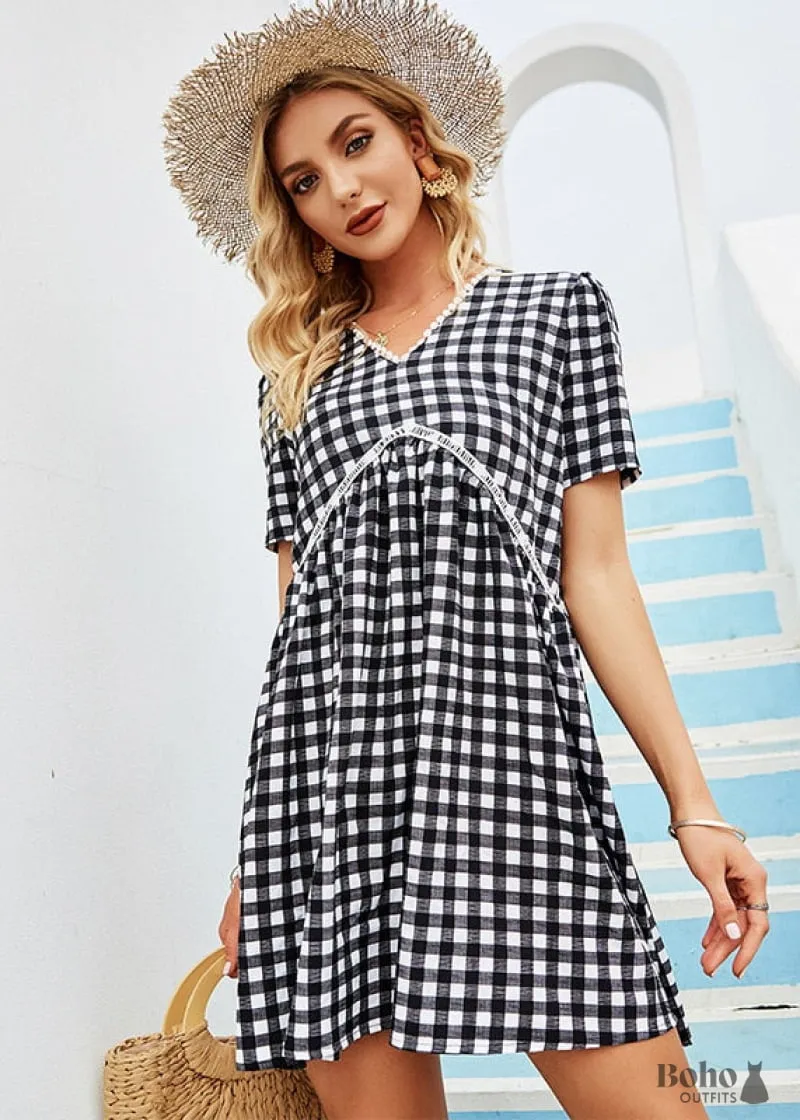 Boho Dress Rowan babydoll mini dress in black and white gingham with crochet v-neck