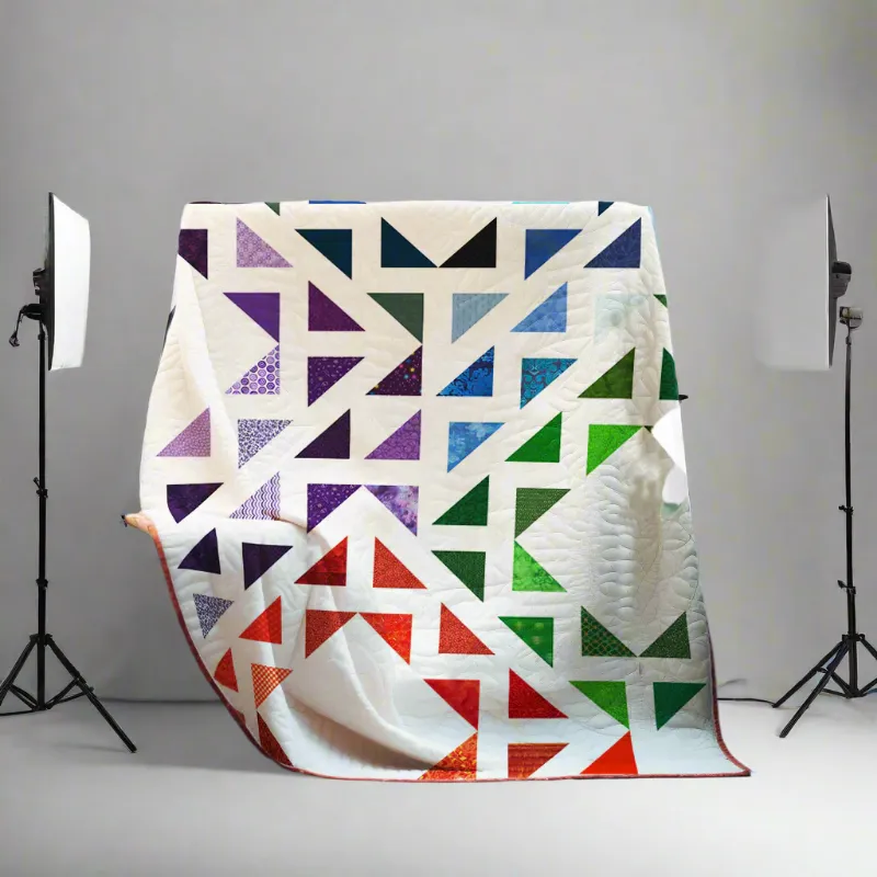 Boho Blanket Prism Dreams Quilt Pattern cover showing a bold tree-ring quilt design in layered colors
