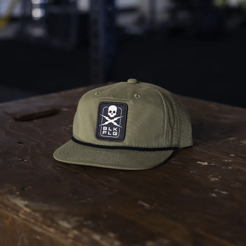 BLK FLG BLADE CAP shown from the side with laser-cut vented panels and flat bill snapback