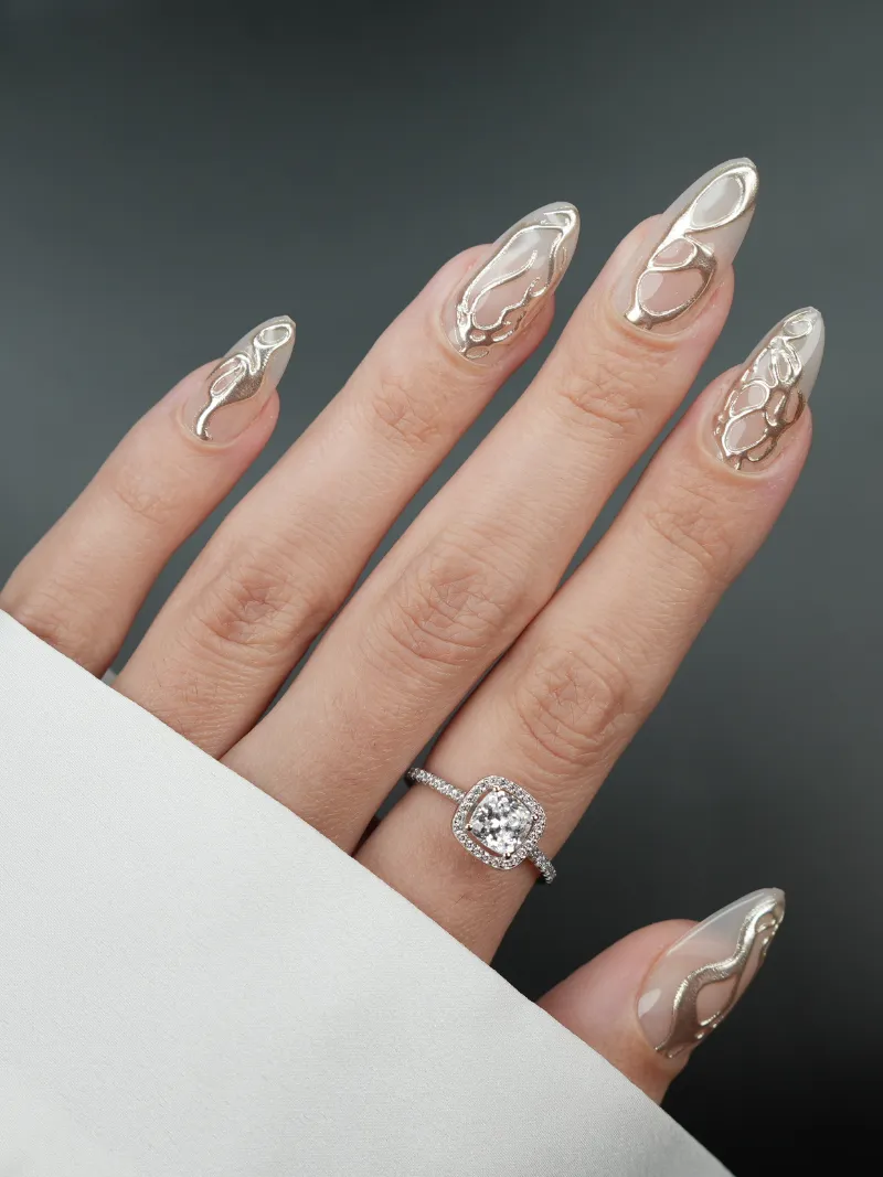 Roxy Nails Paris Fallen angel nails with 3D molten gold and silver design