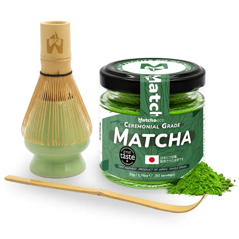 Matchaeco Traditional Ceremonial Matcha Tea Starter Set shown with bamboo whisk, spoon, ceramic stand and matcha powder
