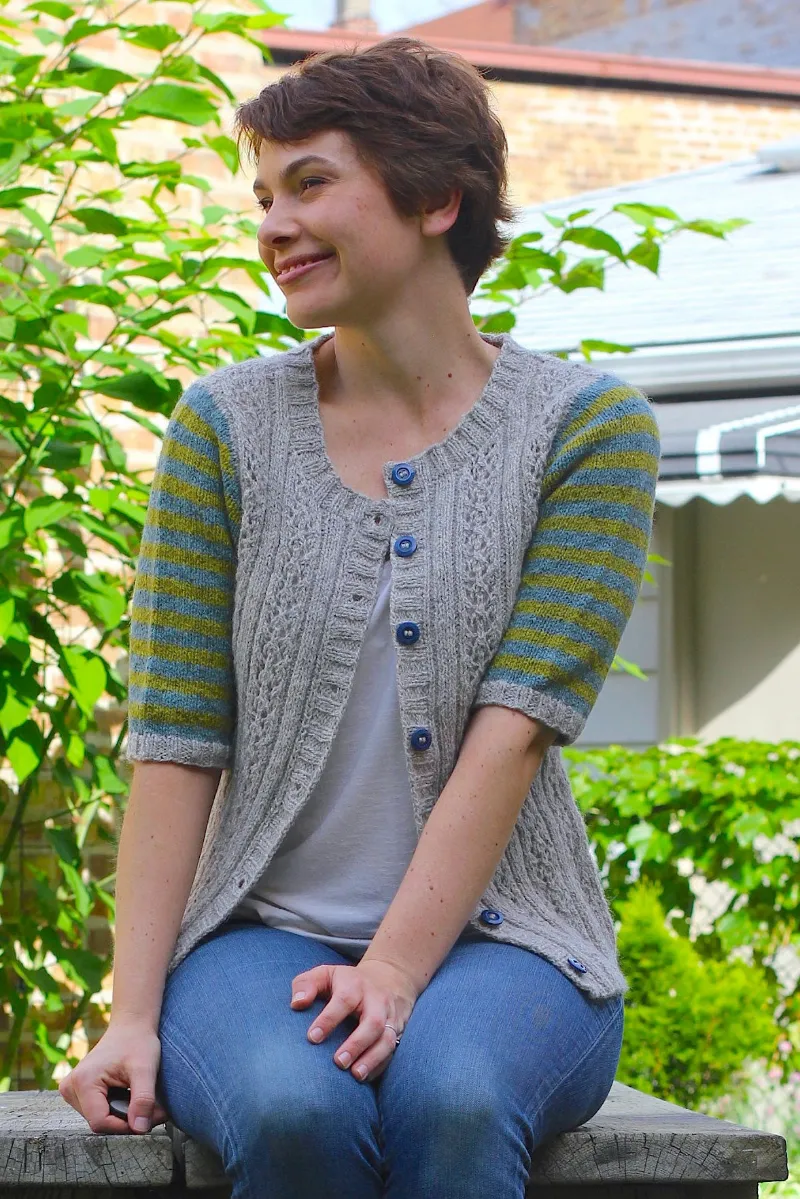 Kristen TenDyke Andi Cardigan knitting pattern showing striped sleeveless lace vest with buttons