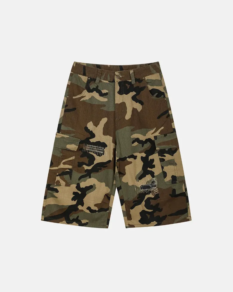 INFLATION Camo Cargo Longline Shorts in camouflage print with cargo pockets and contrast stitching
