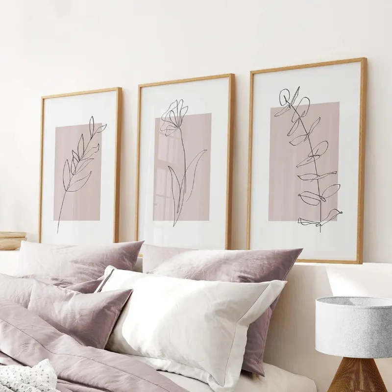 Wall Art Set Blush Pink Botanical Line Art Print Set of 3 showing delicate botanical line drawings in pink