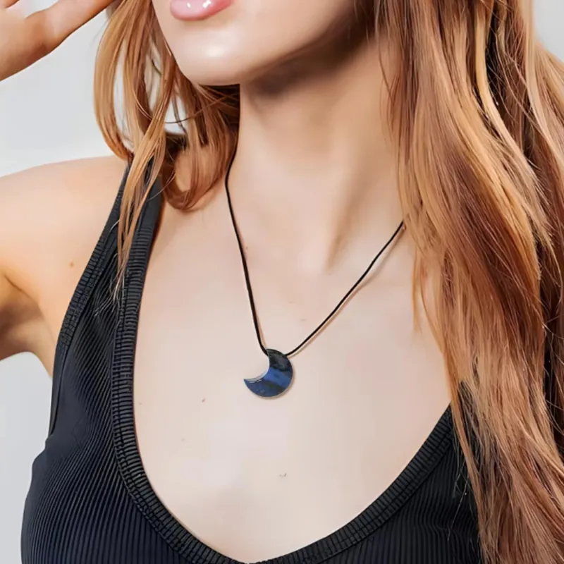 Turix Celestial Moon Necklace with crescent moon pendant holding five different crystals