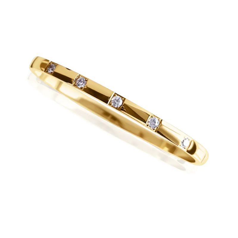 DORSYA Crystal Gold Bangle with seven cubic zirconia stones set in gold-plated band