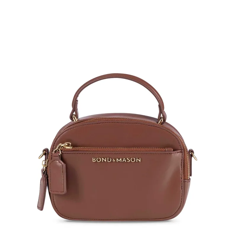 Bond & Mason The Loretta Handbag shown with compact vegan leather shape and gold-tone hardware