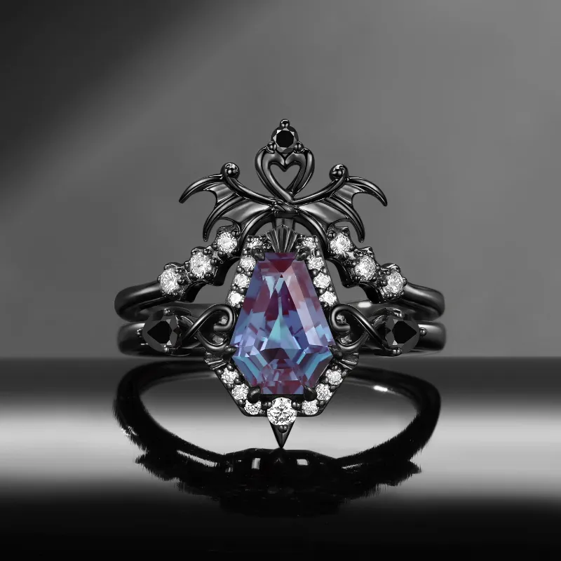 Starlandus 'Dark Arrow of Love' gothic engagement ring set with coffin-cut alexandrite and bat wing detail