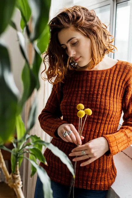 Kristen TenDyke Sinera pullover knitting pattern showing ribbed texture and drop shoulder