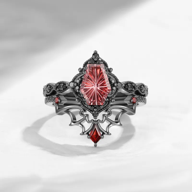 Starlandus 'Dark Romance' gothic fantasy-cut coffin garnet engagement ring set with bat wing filigree