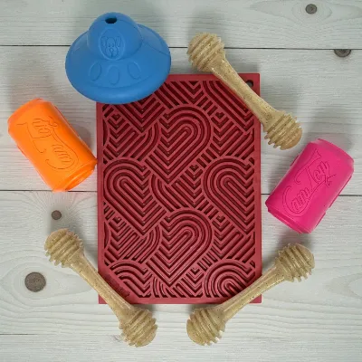 Soda Pup Small Dog Toy Bundle 7 piece enrichment set with slow feeders and lick mats on display