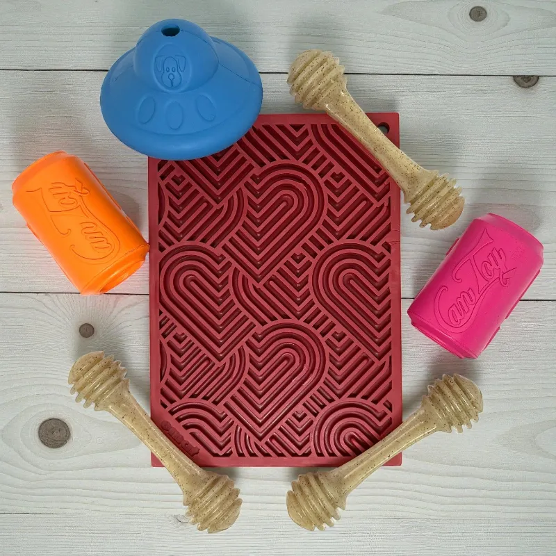 Soda Pup Small Dog Toy Bundle 7 piece enrichment set with slow feeders and lick mats on display