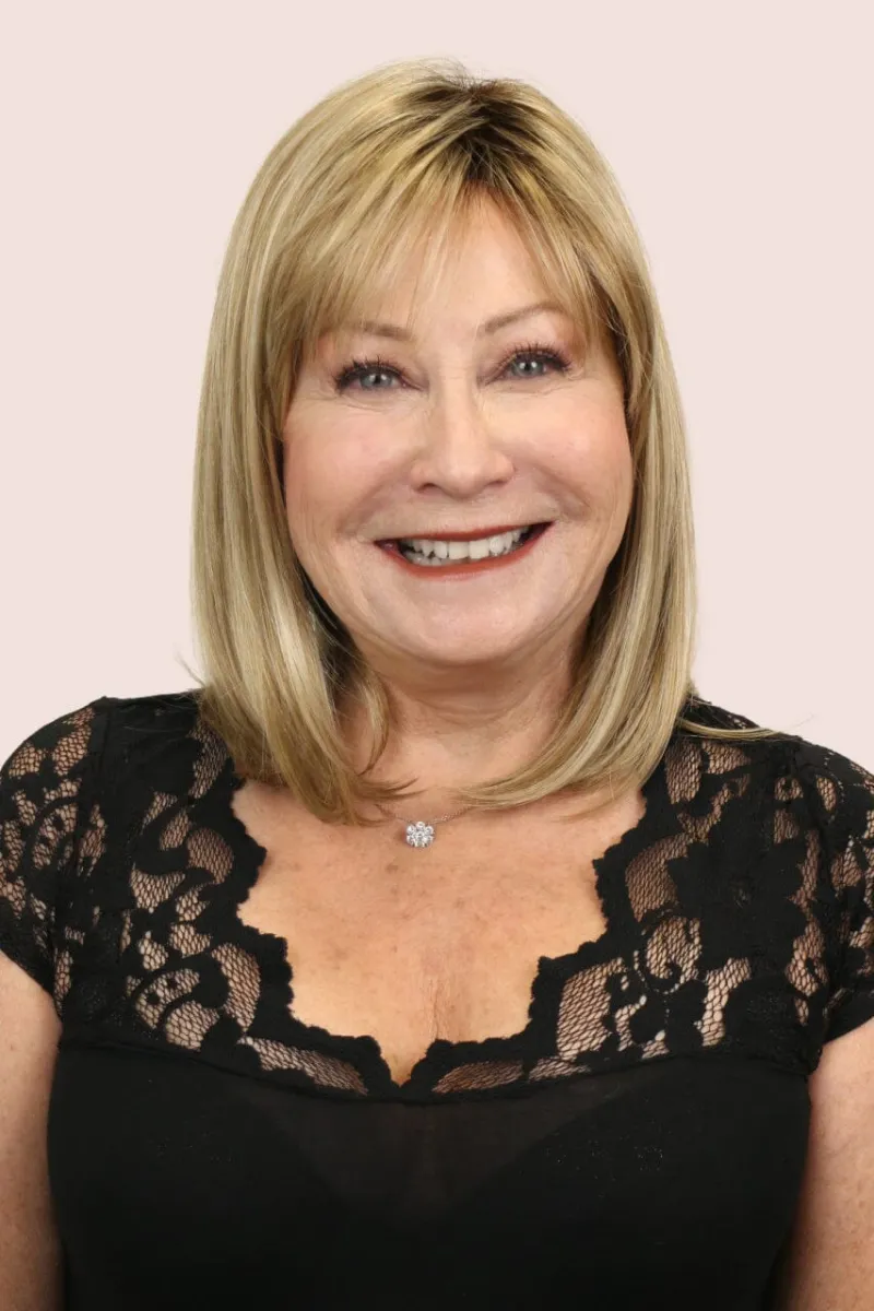 Godiva's Secret Wigs Hope w/ Roots medium wig in Creamy Toffee-R, shoulder-length with bangs