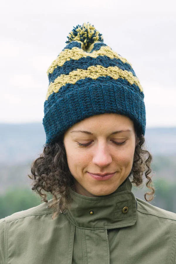 Kristen TenDyke Teego Hat crocheted ribbed beanie with alternating stripes and pompom