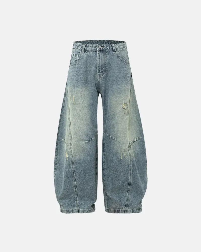 INFLATION Acid Washed Distressed Barrel Jeans in blue with acid wash finish and barrel leg shape