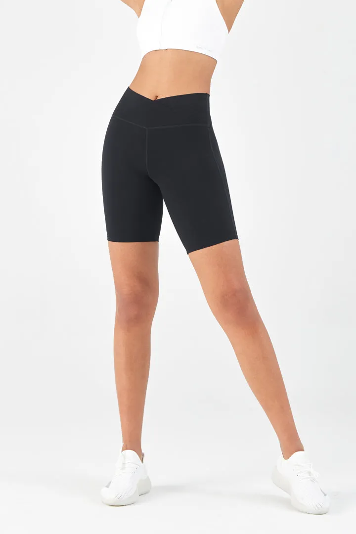 SALTUM High Waisted Crossover Biker Short with Hidden Pocket in black activewear fabric