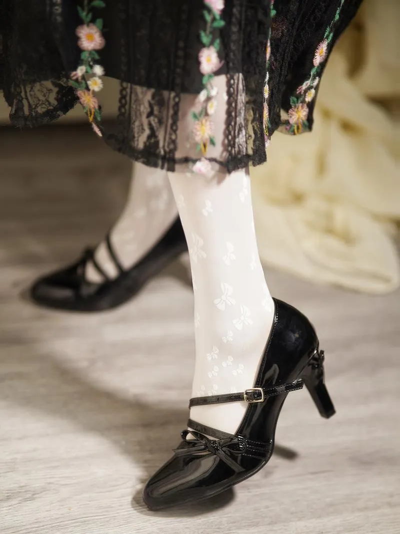 Juwas Black Pointed-Toe Bow High Heel Shoes showcasing elegant stiletto heels with fabric bow trim