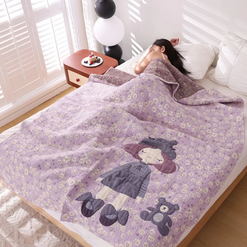 Juwas Adorable Cartoon Girl Purple Blanket folded on a bed showing cartoon print