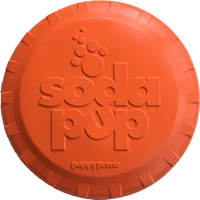 Soda Pup Bottle Top Flyer Rubber Frisbee for Dogs - orange rubber frisbee dog toy on grass