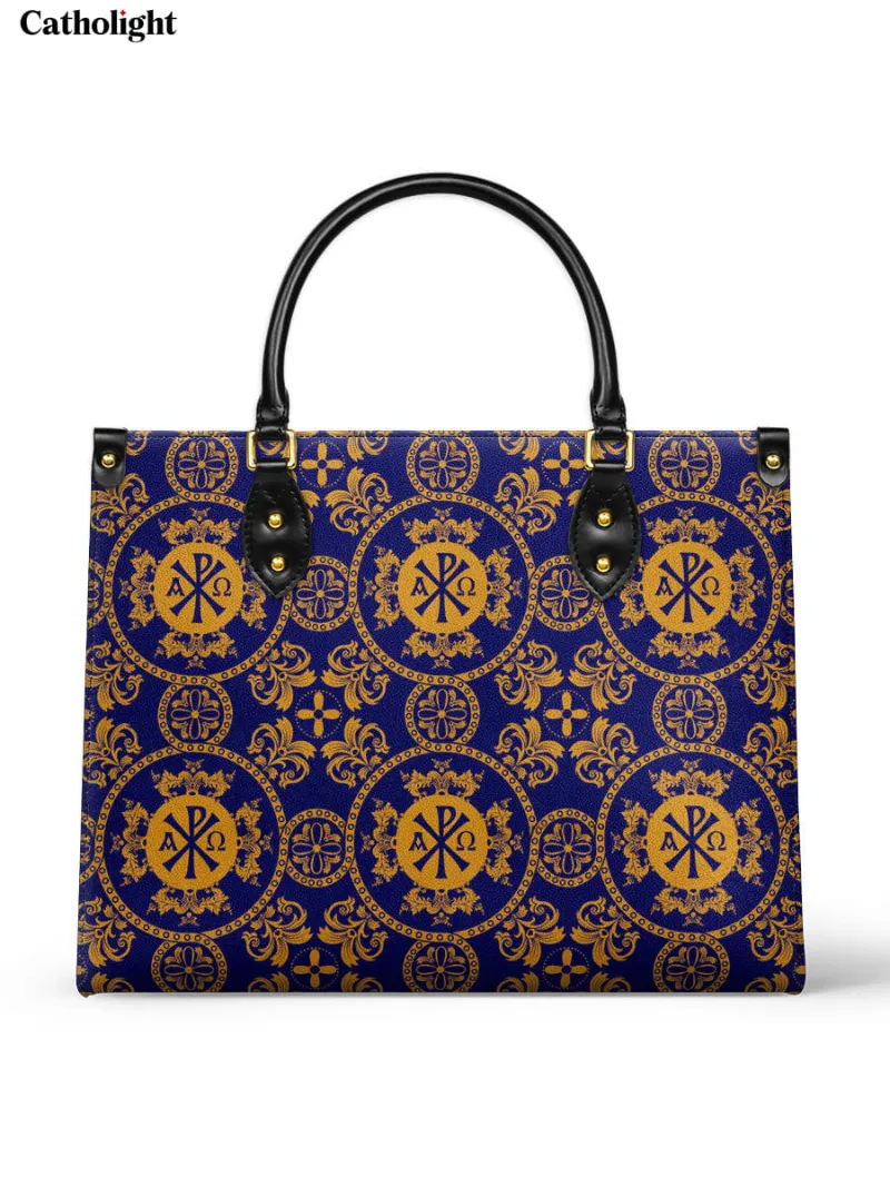 Catholight Eternal Majesty Leather Bag showing Chi Rho symbol in gold on royal blue