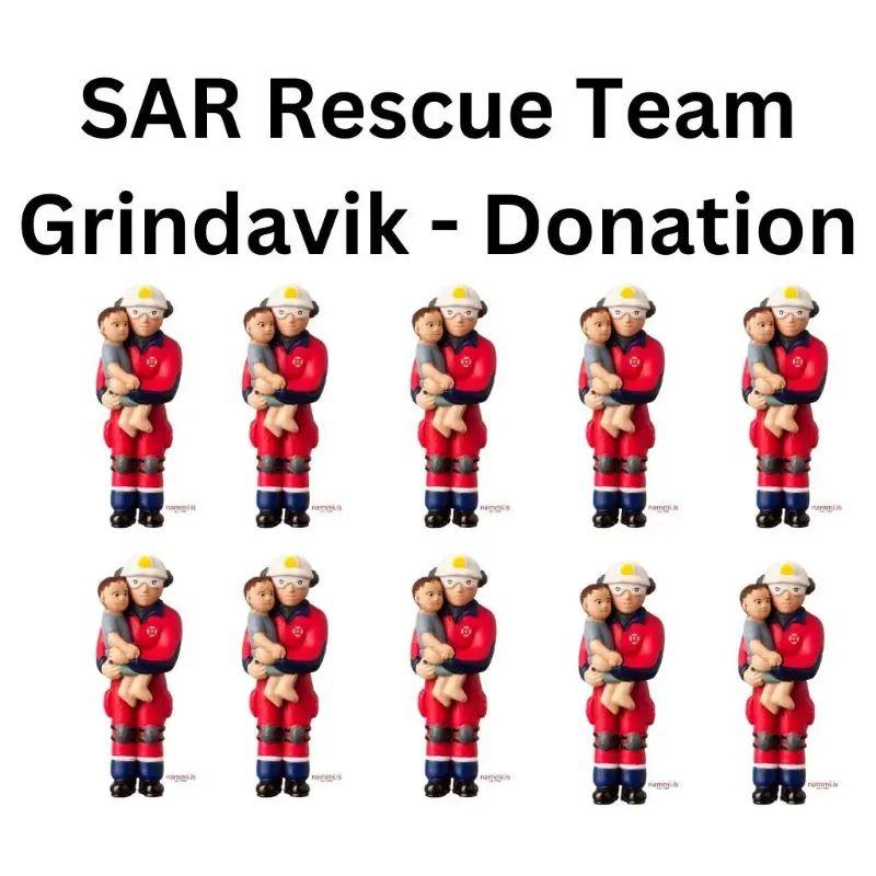 Nammi 10 x Neyðarkall 2010 Rescue Version collector figure showing rescue team member holding child
