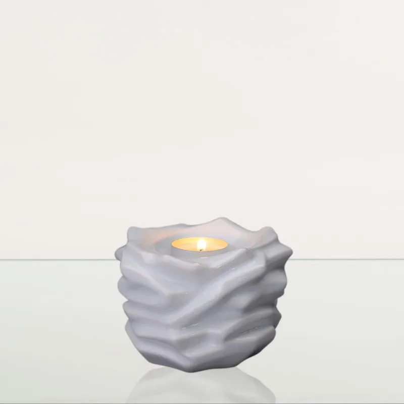 Pulvis Art Urns Candleholder Keepsake Urn For Ashes in white ceramic with petal design