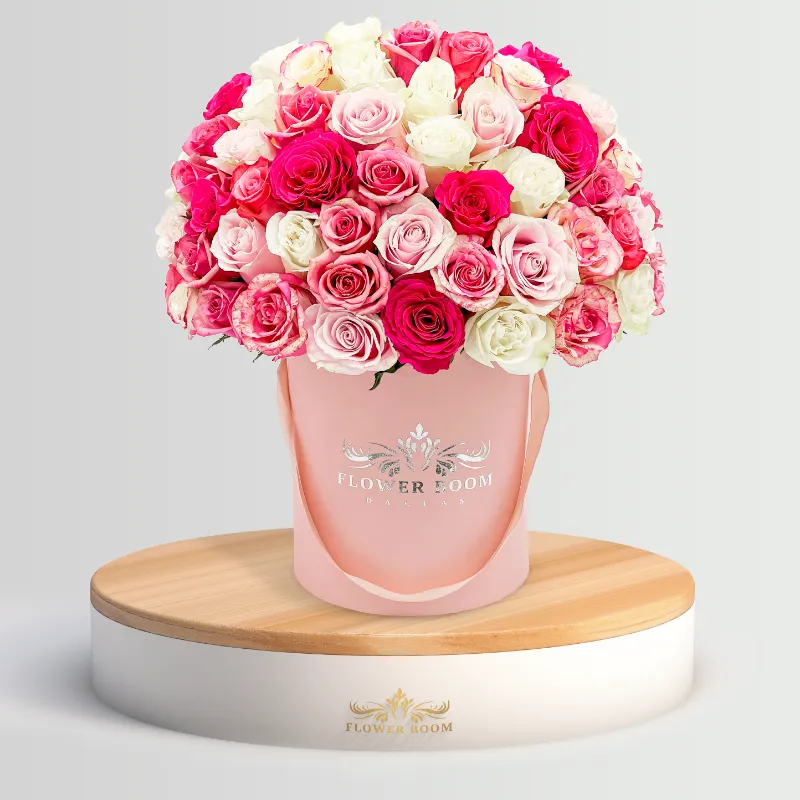 Flower Boom Dallas Colors on arrangement with 50 fresh colorful roses in dome shape