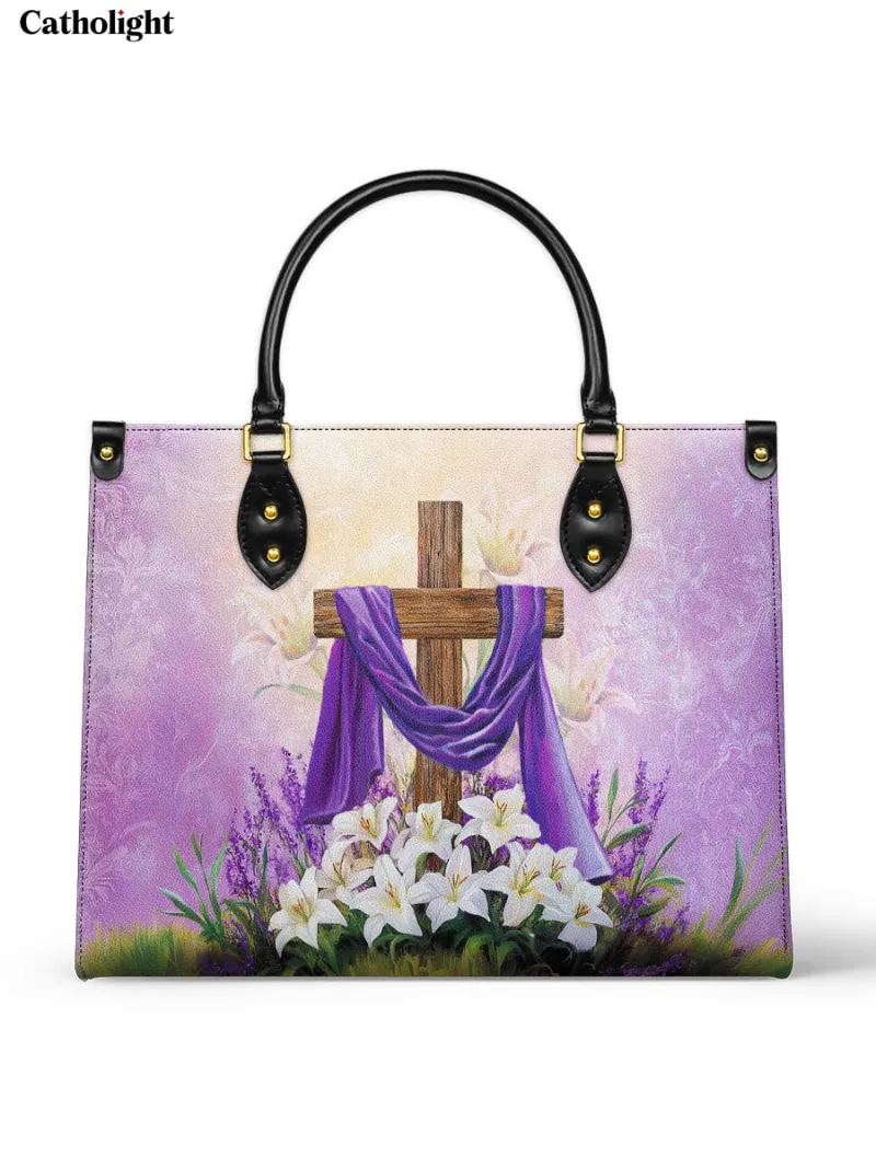 Catholight Faithful Bloom Leather Bag showing Cross with purple cloth and white lilies