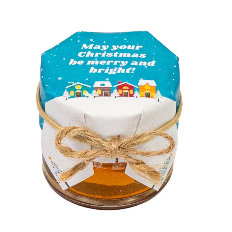 HoneySpree Bright Christmas, mini honey jar in festive red and gold Christmas packaging