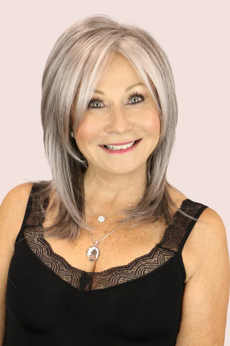 Godiva's Secret Wigs Jenna long wig in Silver Stone, layered with wispy bangs