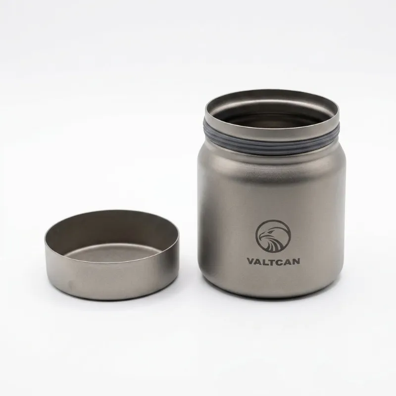 Valtcan Titanium Canister 220ml, lightweight, shown next to a matchbox for scale