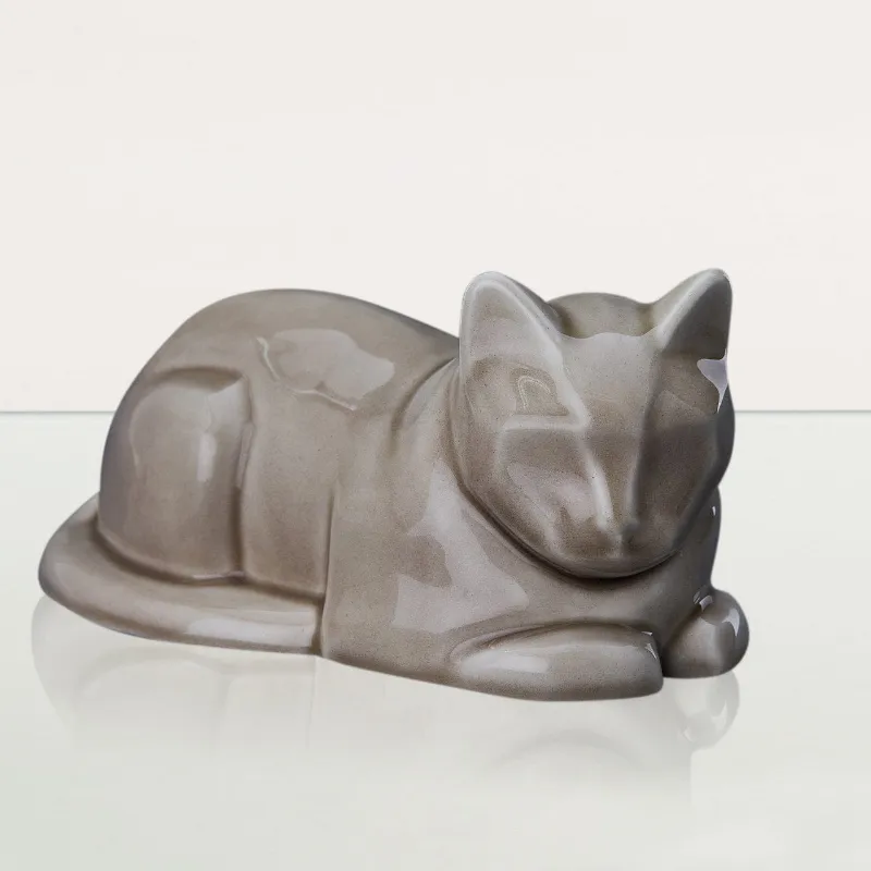 Pulvis Art Urns laying cat cremation urn in beige grey ceramic