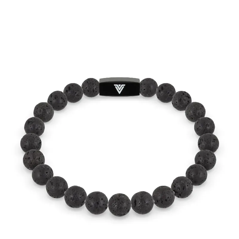 VOLTLIN Lava Stone Stretch Bracelet on black suede pouch showing natural matte black beads