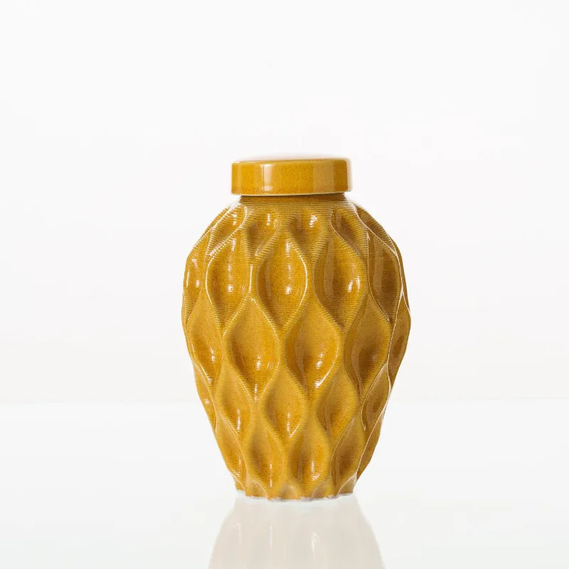 Pulvis Art Urns Echo 3D Printed Ceramic Urn in Amber Yellow, Medium size showing distinctive textured surface