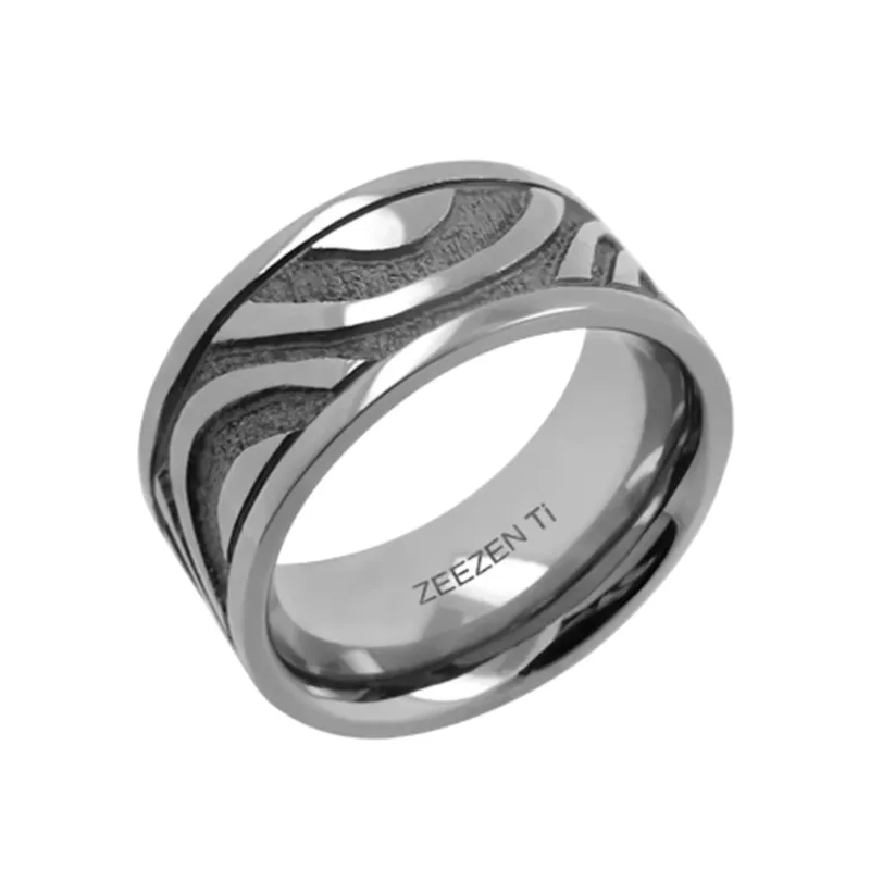 Nammi Celtic Titanium Ring showing hand-polished and oxidized Celtic pattern on wide titanium band
