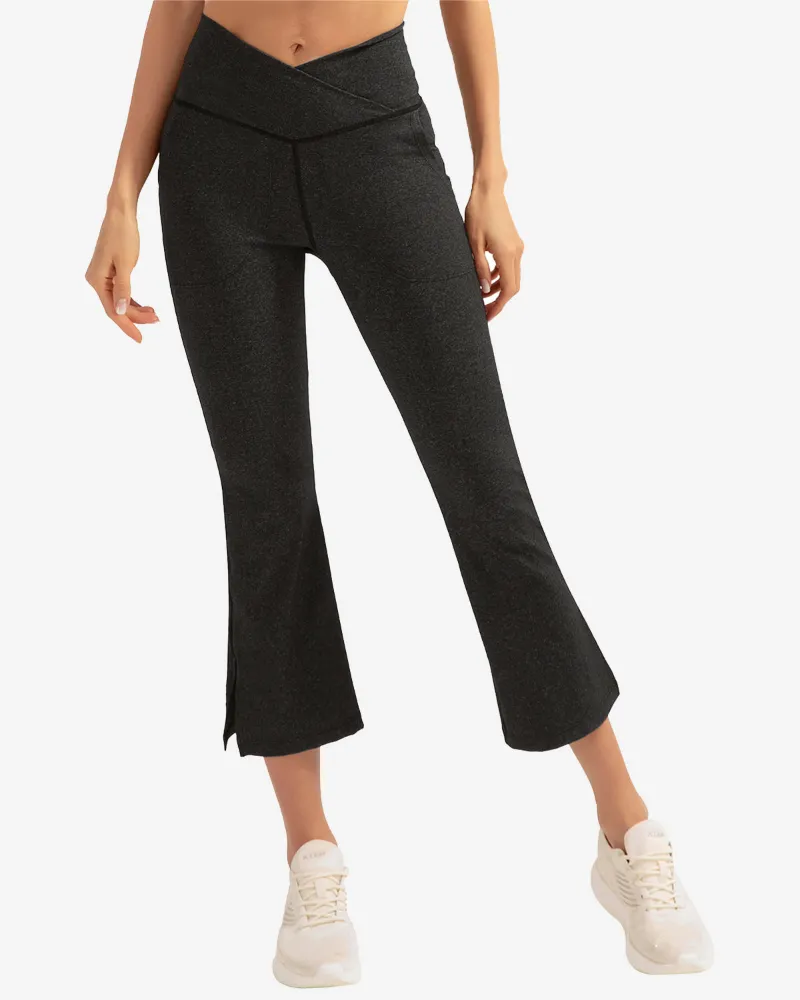 QUEENIEKE hip-lifting flared trousers legging in black, front view showing crisscross waist and side pockets