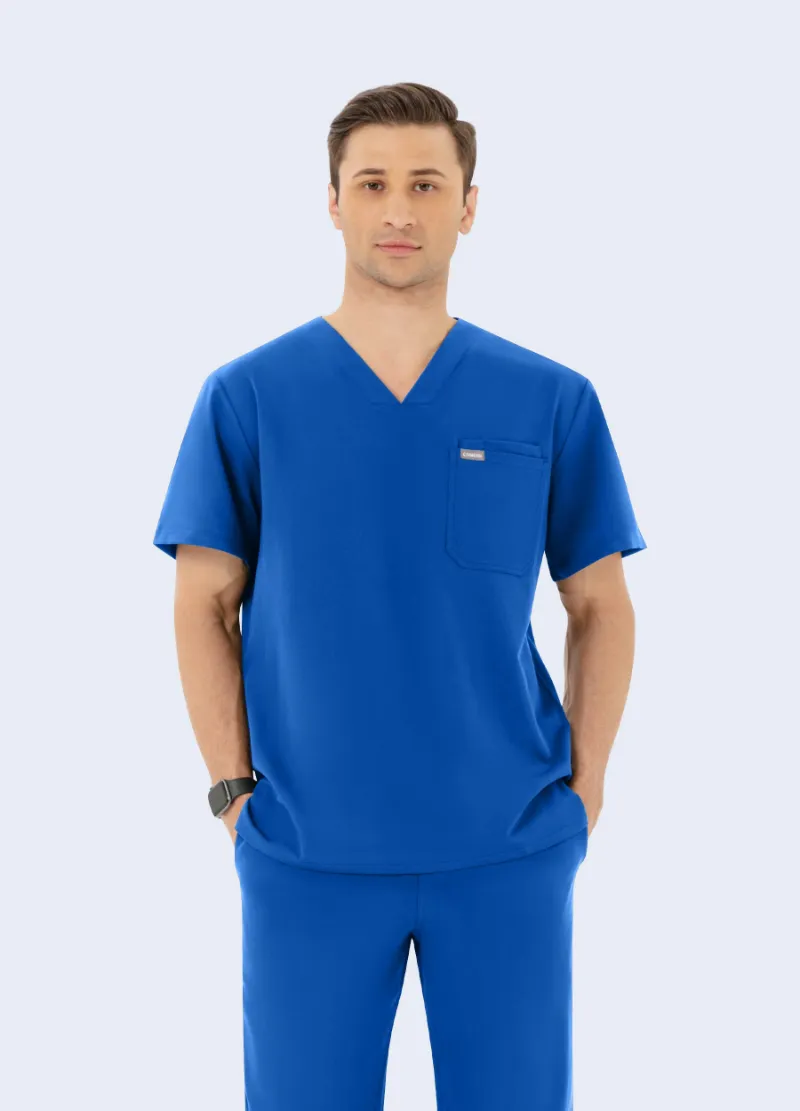 COMENII DynaComfort Essential Scrub Top Royal Blue front view showing V-neck and chest pockets