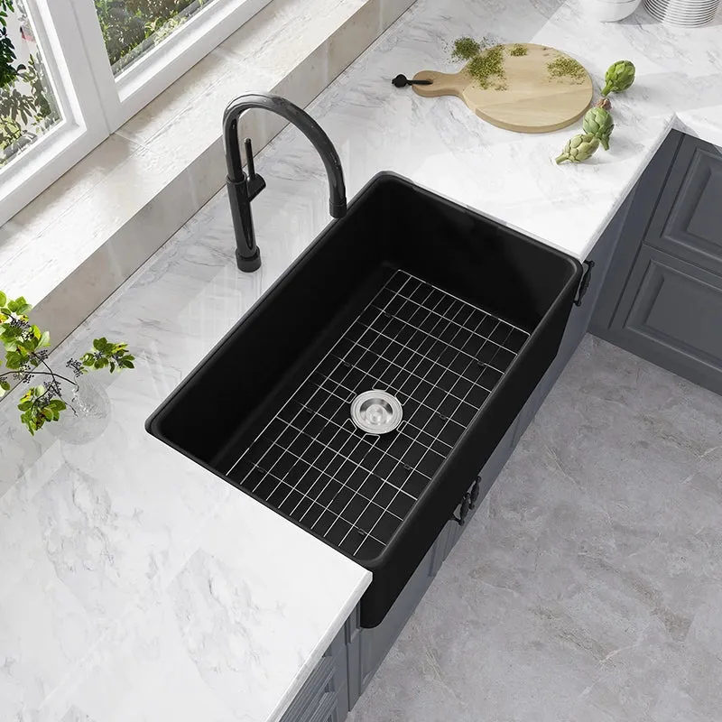 HOROW matte black farmhouse apron sink with single bowl in a kitchen