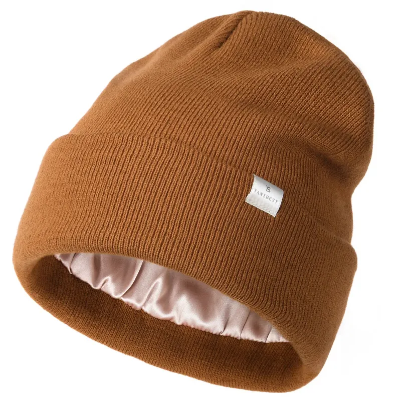 Yanibest Butter Satin Lined Knit Skull Beanie in dark orange shown from the side